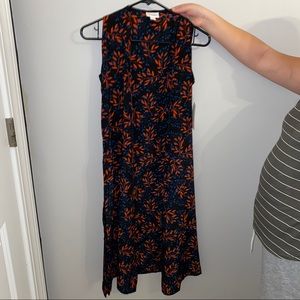 women's blue and red floral shaw with slits.